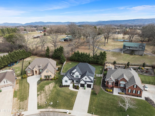 bird's eye view featuring a residential view and a mountain view