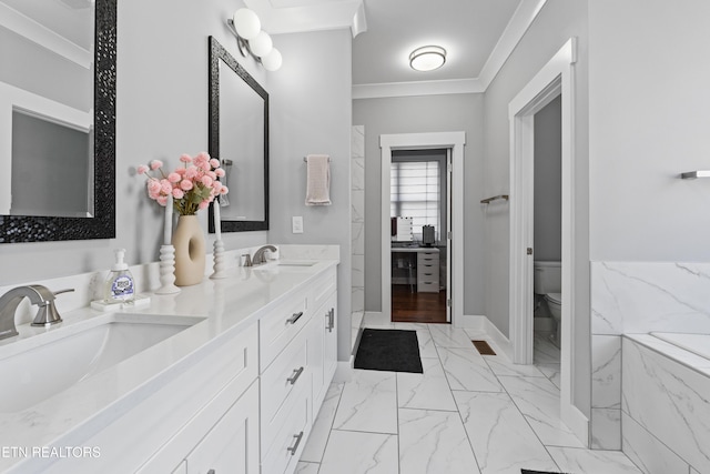 full bathroom featuring ornamental molding, marble finish floor, a sink, and toilet