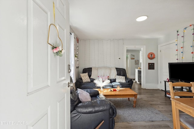 living area with wood finished floors