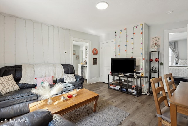 living area with wood finished floors