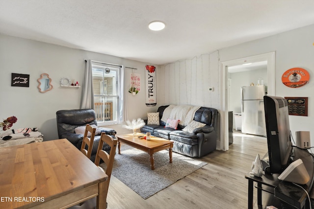 living room with light wood-style floors