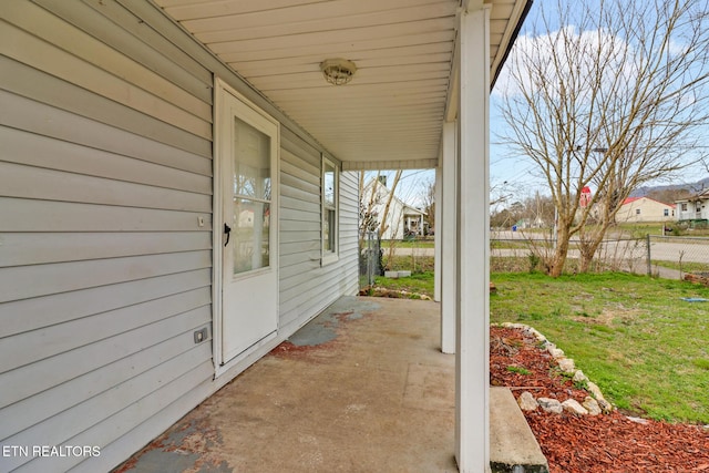 view of patio / terrace featuring fence