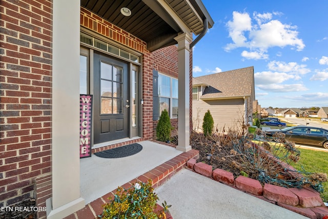 property entrance featuring a porch