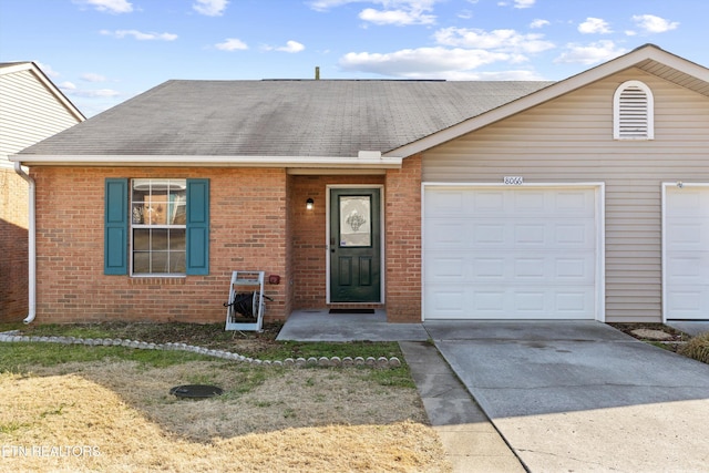 single story home with a garage