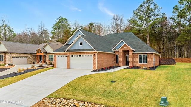 view of front facade with a garage and a front yard