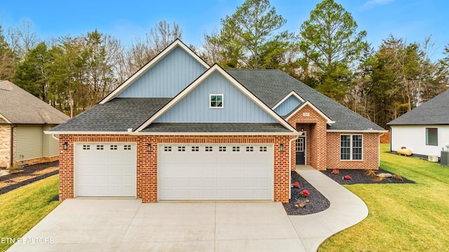 view of front of home with central AC and a front lawn