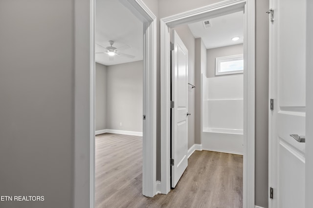 hallway featuring light hardwood / wood-style floors