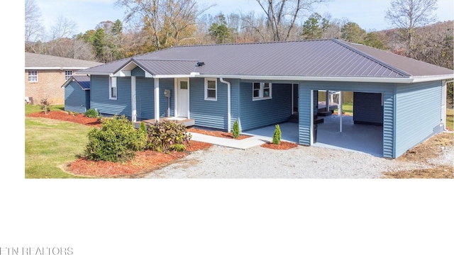 single story home featuring a carport