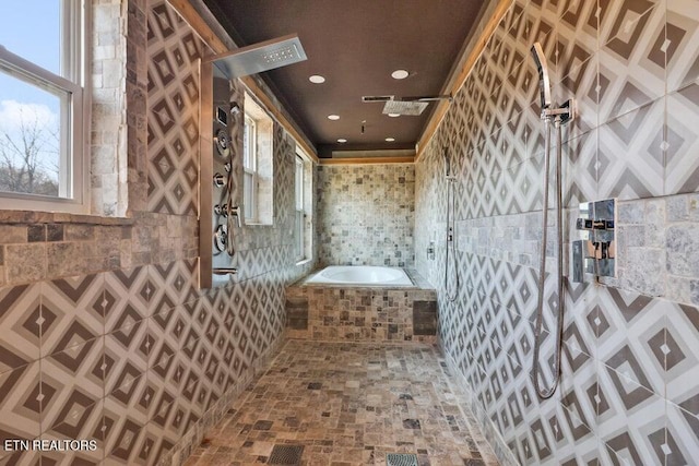 bathroom with tiled bath