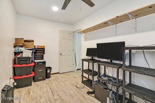 office space featuring light hardwood / wood-style flooring and ceiling fan