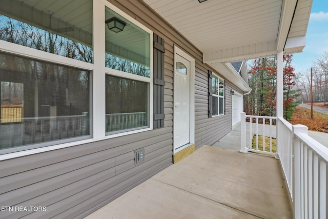 view of patio featuring a porch