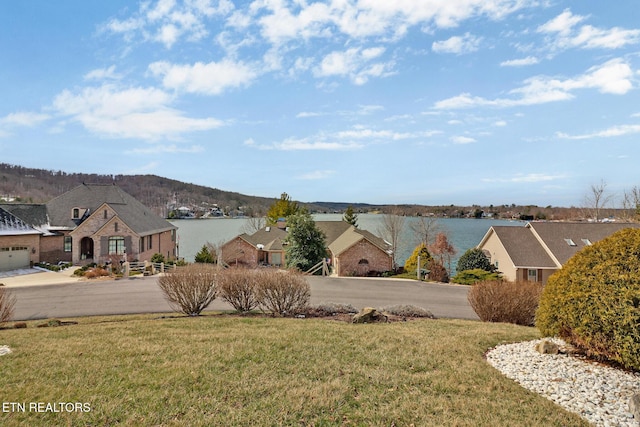 view of yard with a water view