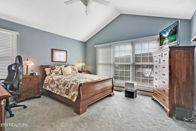 carpeted bedroom featuring vaulted ceiling and ceiling fan