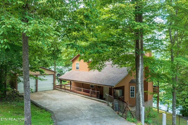 1447 Cove Pointe Rd, Lafollette, TN 37766 - chalet / cabin featuring an outbuilding and roof with shingles