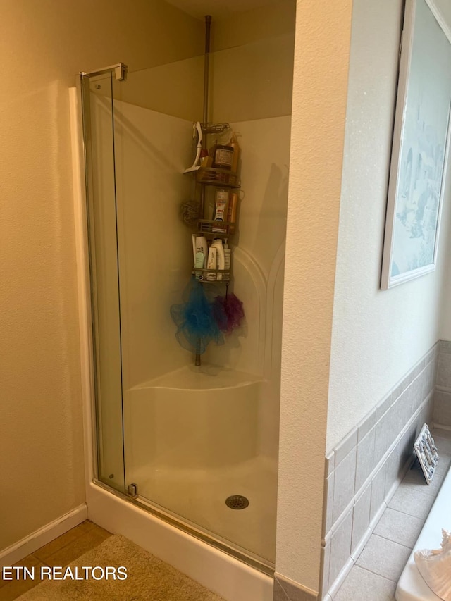 bathroom featuring walk in shower