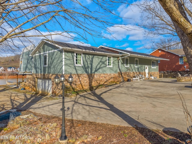 view of side of property featuring a garage