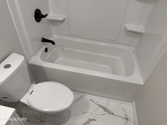 bathroom featuring toilet