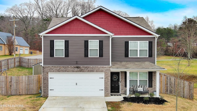 view of front facade with a garage and a front yard