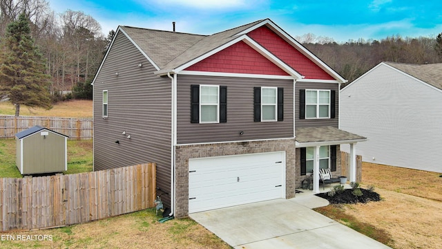 view of front facade with a garage and a front lawn