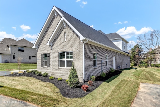 11707 Grigsby Chapel Rd, Knoxville, TN 37934 - view of property exterior featuring brick siding and a yard