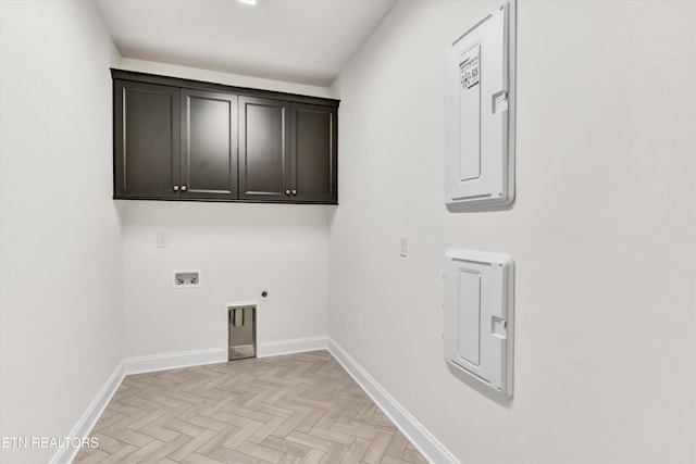 11707 Grigsby Chapel Rd, Knoxville, TN 37934 - laundry room with hookup for an electric dryer, hookup for a washing machine, cabinet space, and baseboards