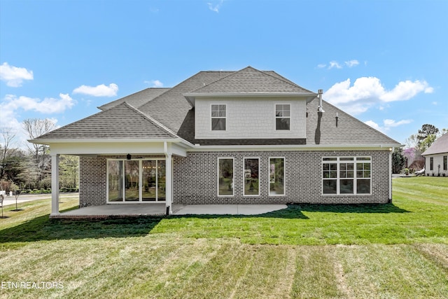 11707 Grigsby Chapel Rd, Knoxville, TN 37934 - back of property featuring a patio area, brick siding, a lawn, and a shingled roof