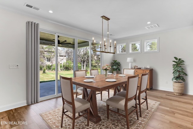 11707 Grigsby Chapel Rd, Knoxville, TN 37934 - dining space featuring ornamental molding, light wood-style flooring, baseboards, and recessed lighting