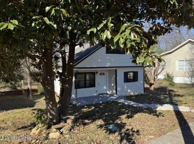 view of front of house with a patio area