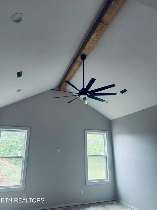 interior details featuring ceiling fan and beamed ceiling