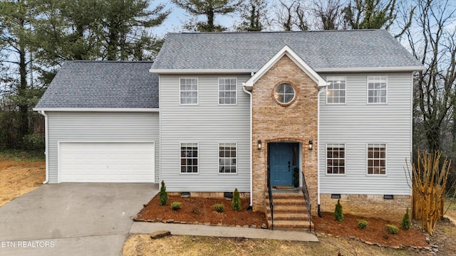 view of front of home with a garage