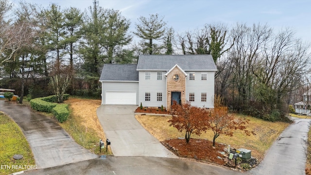 view of front of property with a garage