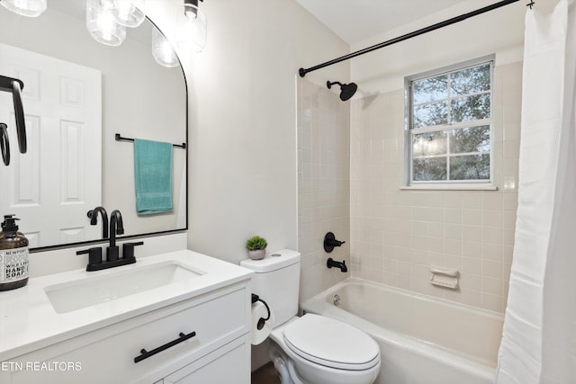 full bathroom with vanity, shower / bath combination with curtain, and toilet