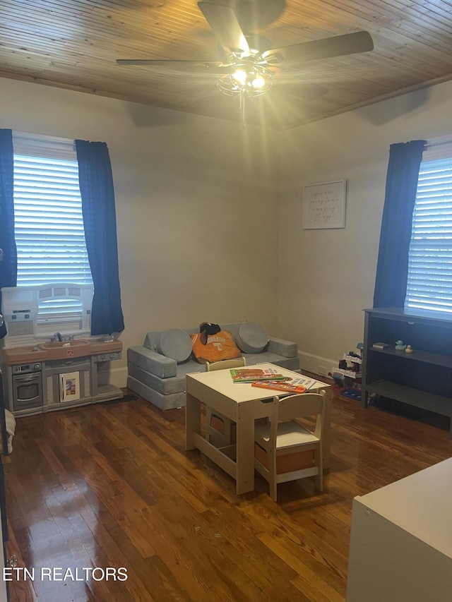 interior space with cooling unit, ceiling fan, wood ceiling, and dark hardwood / wood-style floors