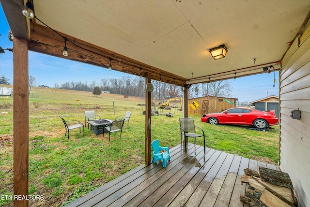 deck featuring a yard