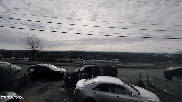 view of parking at dusk