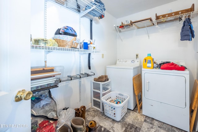 437 County Road 267, Niota, TN 37826 - laundry room with washer and dryer, laundry area, and stone finish flooring