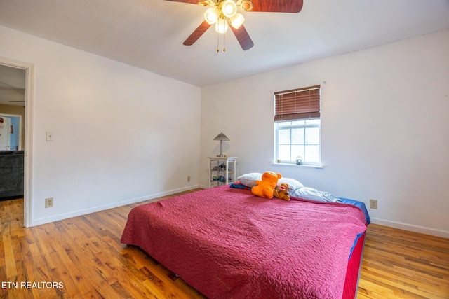 437 County Road 267, Niota, TN 37826 - bedroom with ceiling fan, baseboards, and wood finished floors