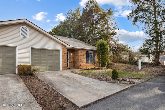 ranch-style house featuring a garage