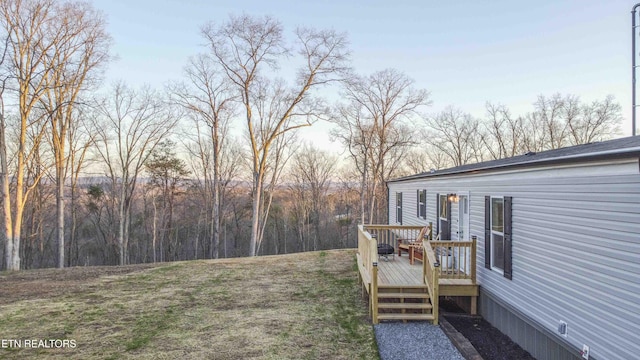 view of yard with a deck