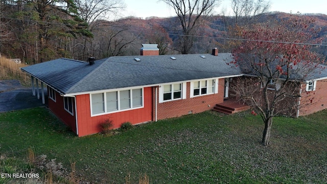 exterior space with a yard