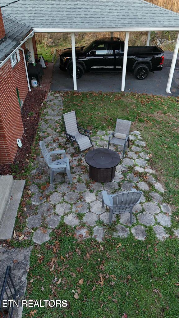 view of yard featuring a carport