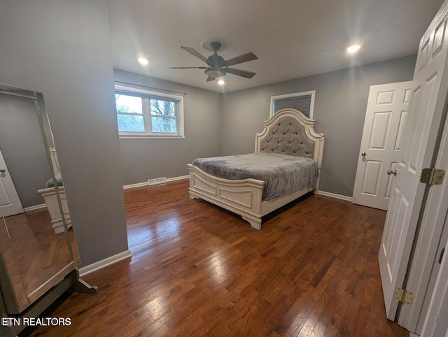 bedroom featuring dark wood-type flooring and ceiling fan