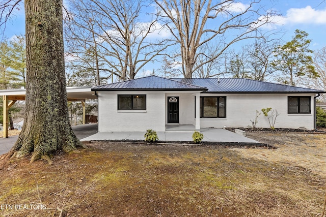 view of front of house with a carport