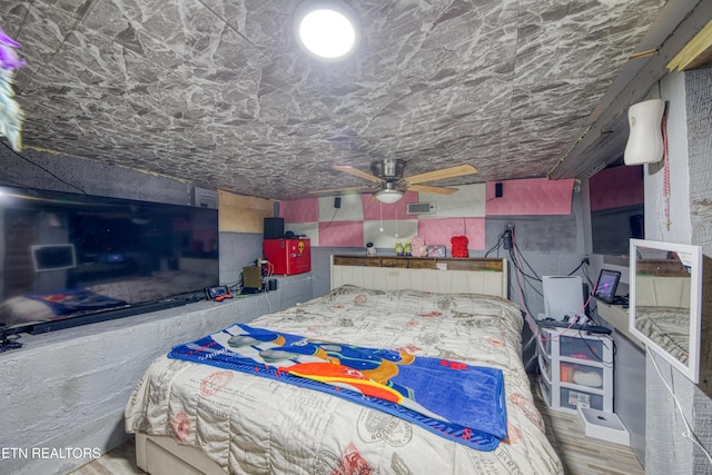 bedroom featuring hardwood / wood-style flooring