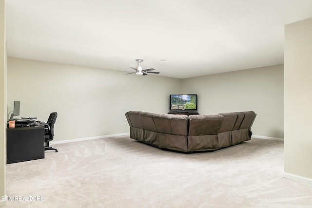 living room with carpet and ceiling fan