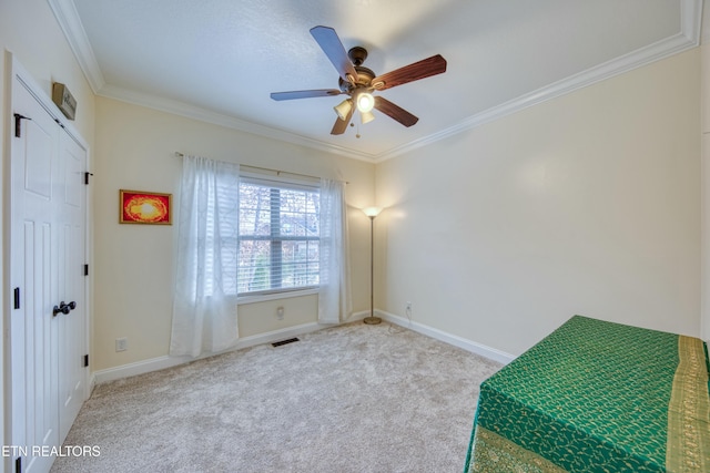 interior space featuring crown molding and ceiling fan