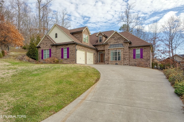 view of front of property featuring a garage and a front yard