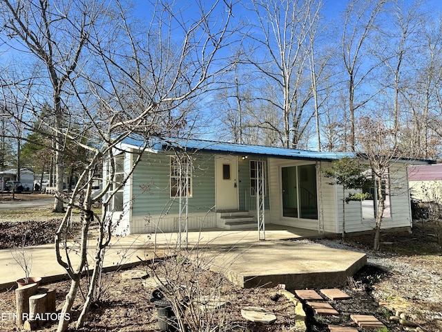 view of front of home featuring a patio area