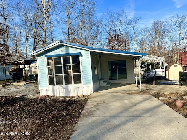 exterior space with a carport