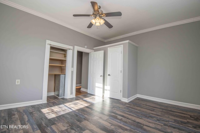 unfurnished bedroom featuring ornamental molding, dark hardwood / wood-style floors, and ceiling fan